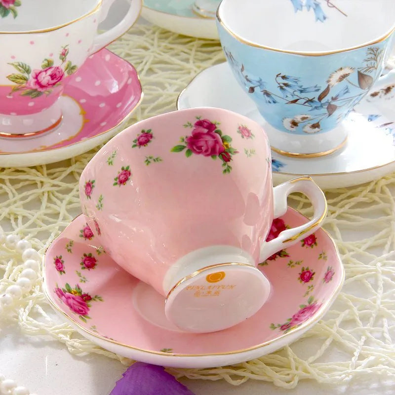 European porcelain coffee cup and saucer set with pastoral style pattern in assorted colours