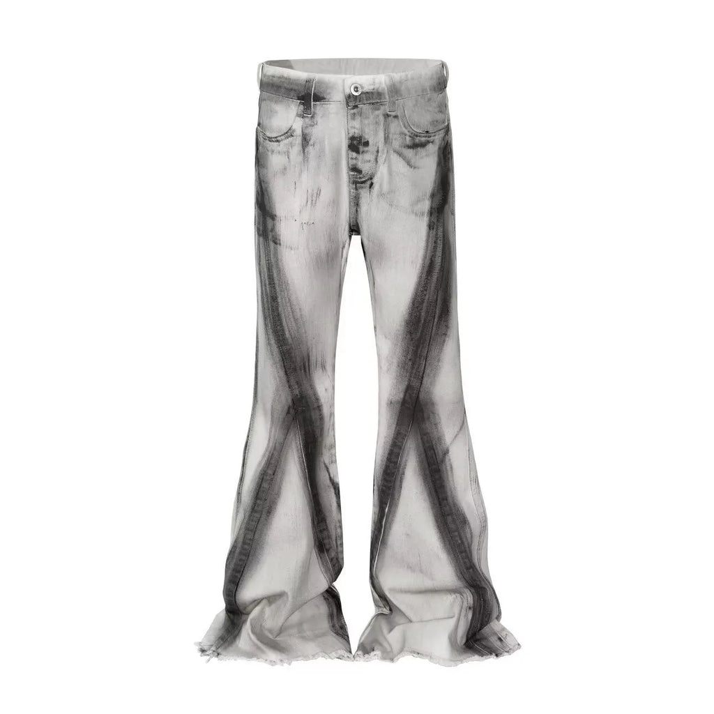 White retro-style selvedge denim jeans with a black ribbon gradient detail on the leg.