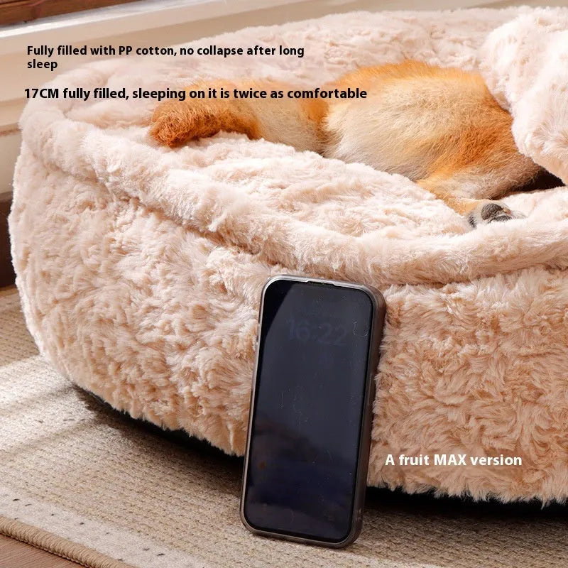 Round nest style pet bed in a milk tea colour with a removable cloth cover.