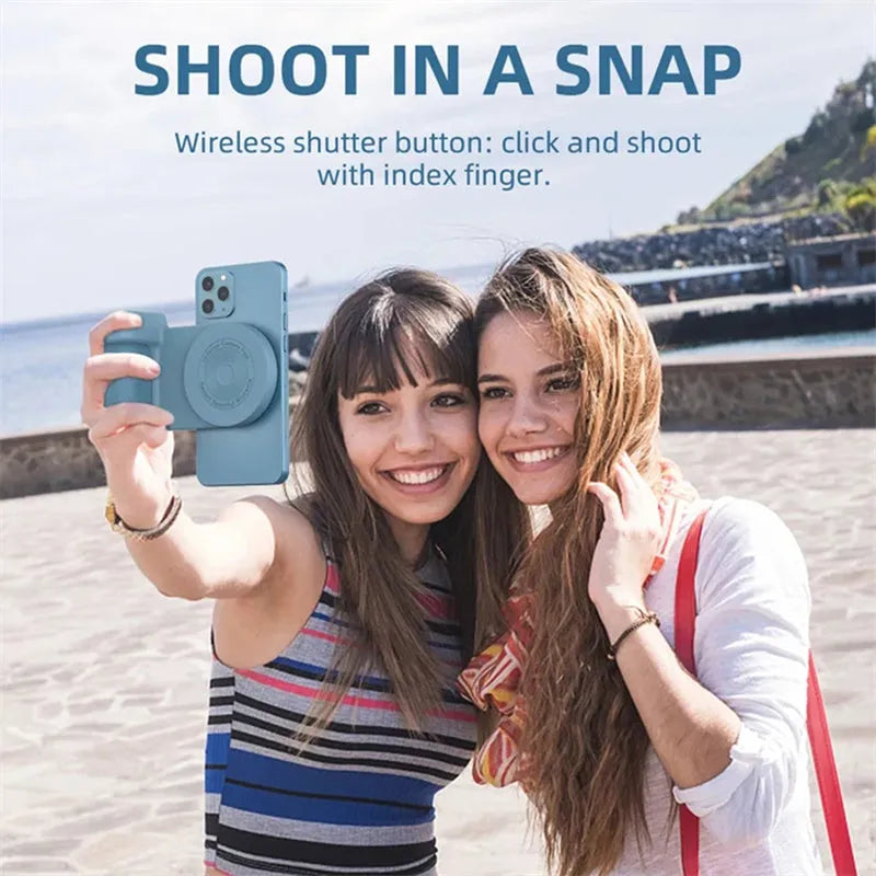 Black magnetic phone camera holder with rotatable bracket and ergonomic leather handle on a table.