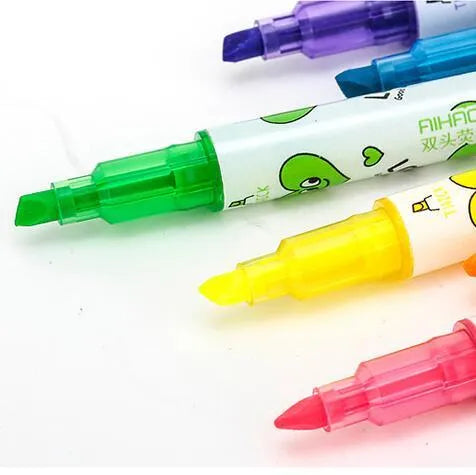 Six double-headed watercolour highlighter pens in pink, orange, yellow, green, blue, and purple colours