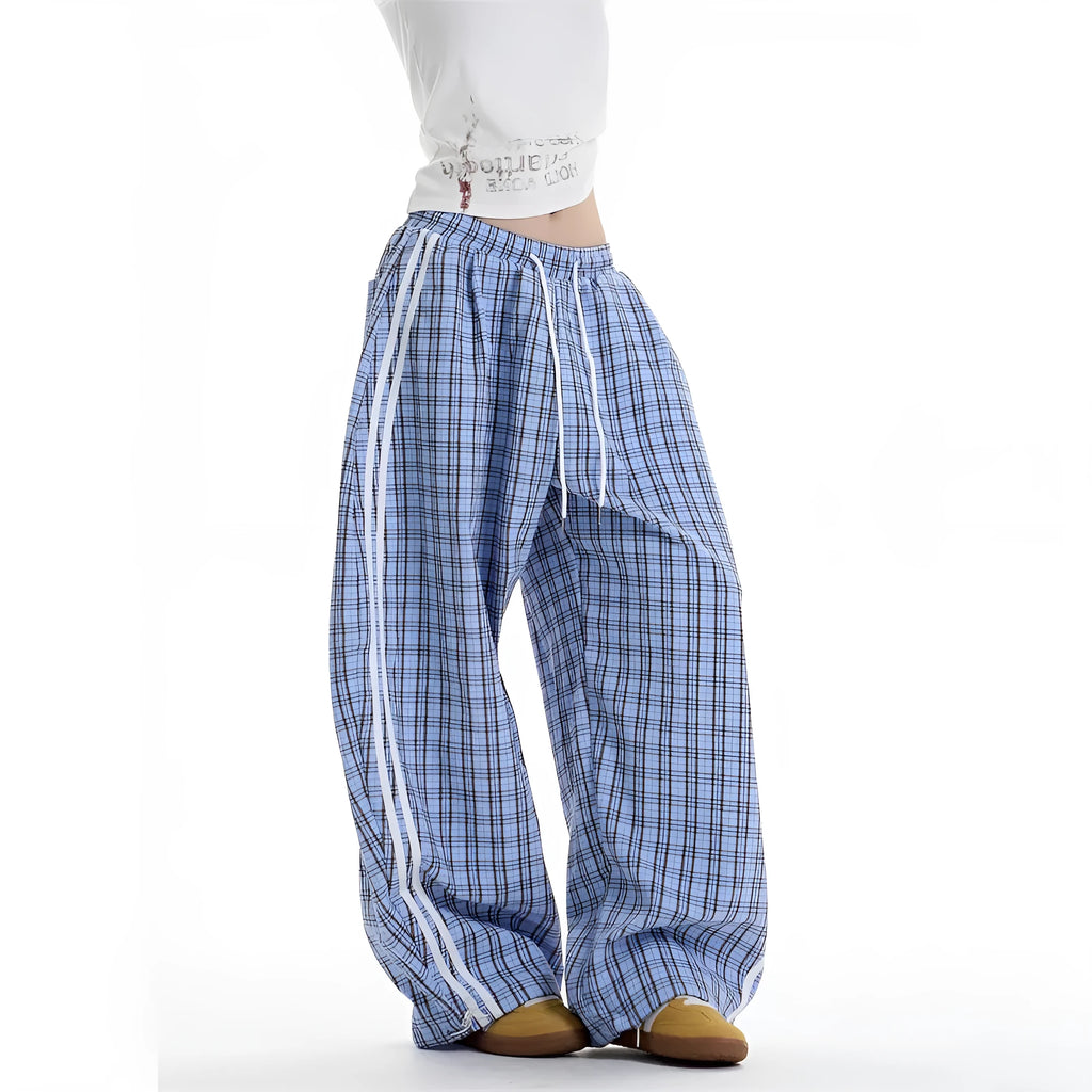 Loose straight drooping wide leg polyester trousers for women with side pockets, available in blue and yellow, sizes S to XXL