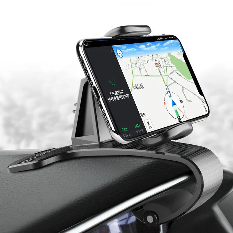 Black 360-degree adjustable universal car phone holder on a dashboard