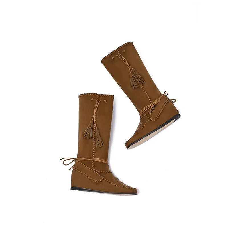 Mid-top western cowboy boots in brown or black with suede leather lining, square toe, low flat heel and rubber sole.