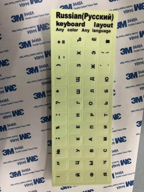 Yellow glowing PVC keyboard stickers with Arabic, Thai, Hebrew, French, Italian, and German language characters