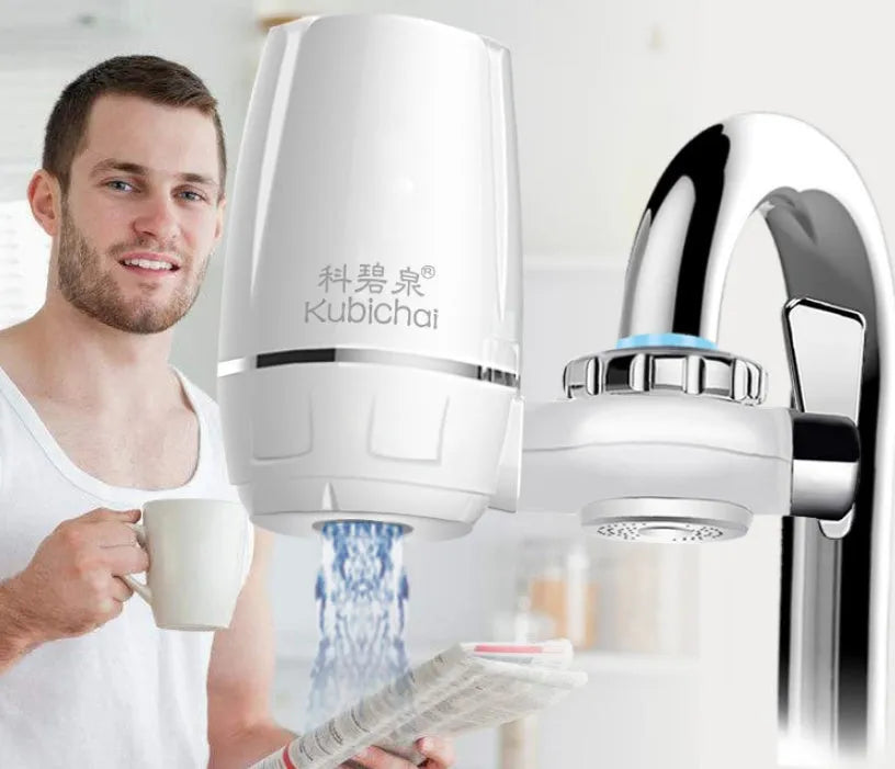 White kitchen faucet water filter with ceramic cartridge and universal thread adapters for tap mounting.