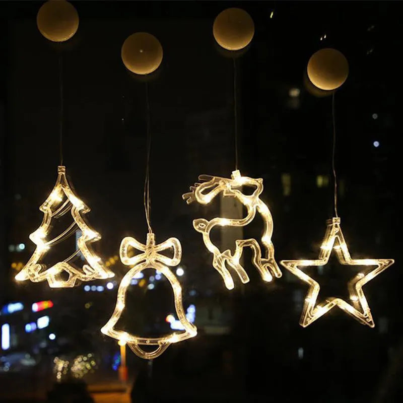 Christmas LED decorative light with suction cup showing Santa Claus, elk and snowman designs on window