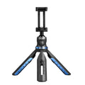 Black plastic and aluminium desktop tripod stand holding a mobile phone.