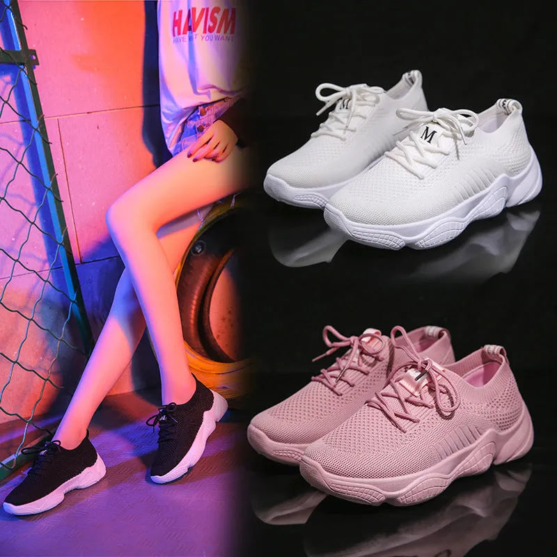 Women's white thick-soled sports shoe with woven upper and front strap