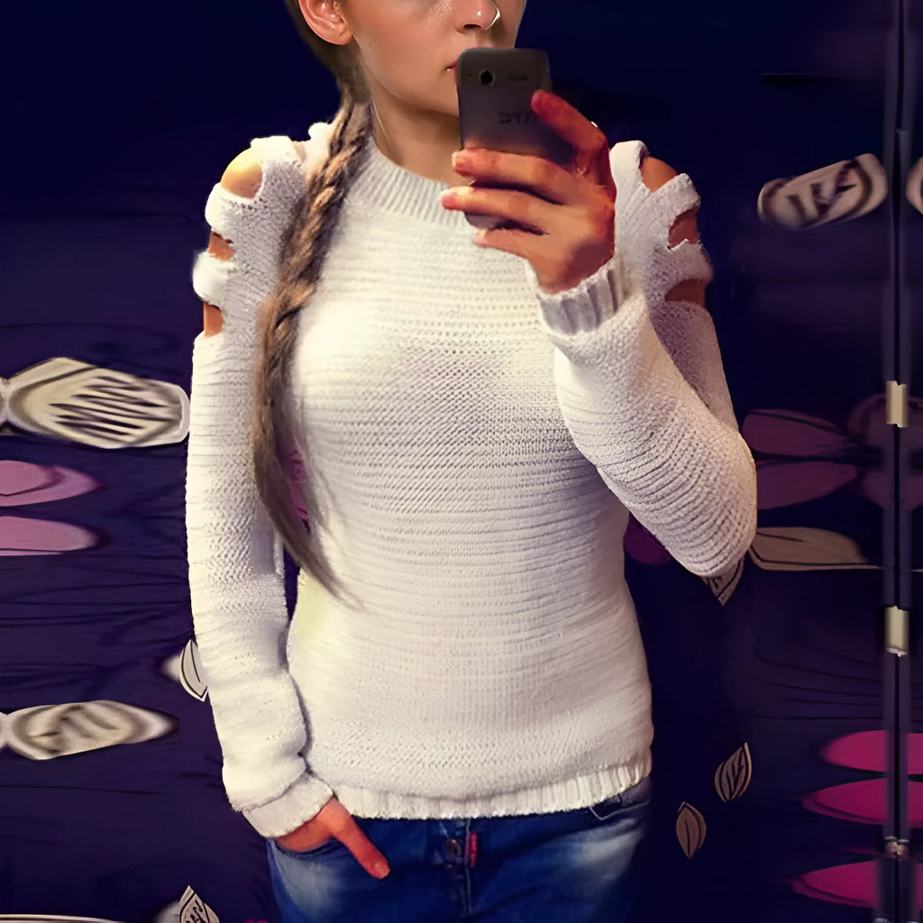 Women's grey crocheted shirt with hollow-out pattern and round neck.