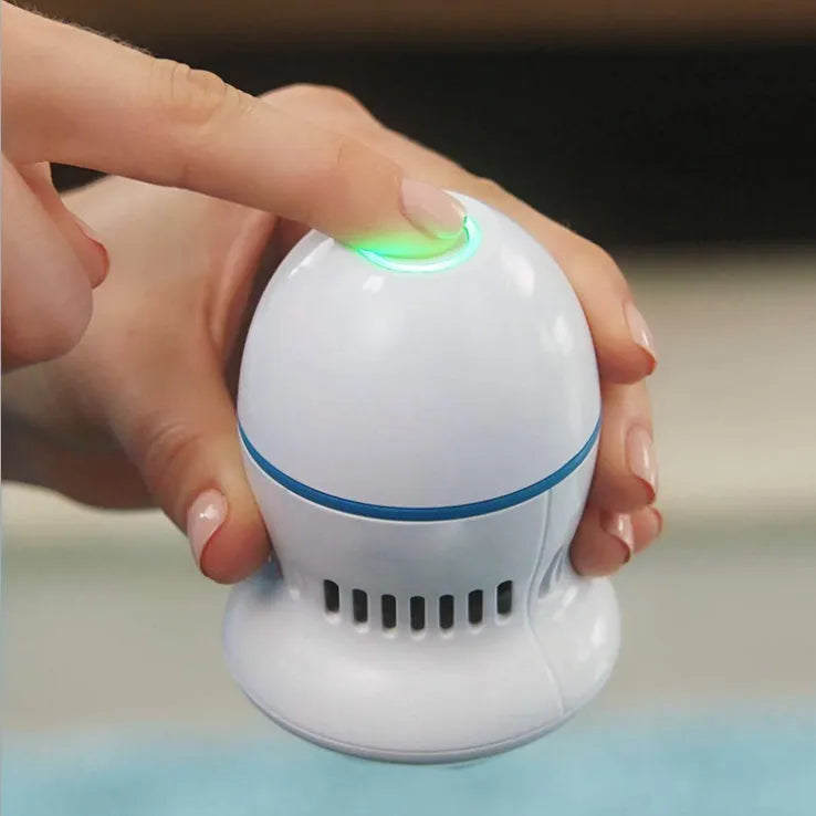 Beige electric foot file grinder with vacuum system and USB charging cable