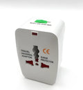 Compact universal travel plug converter with multi-country socket compatibility for mobile phone charging.