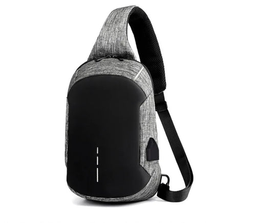 Dark blue Oxford cloth waterproof chest bag with zip and adjustable strap, shown on a person's chest.