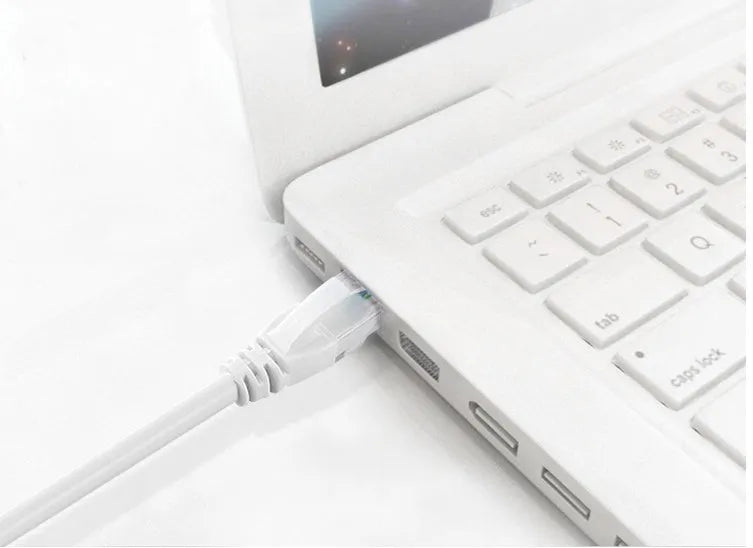 White Cat6 RJ-45 Ethernet network cable with CCA conductors on a plain background