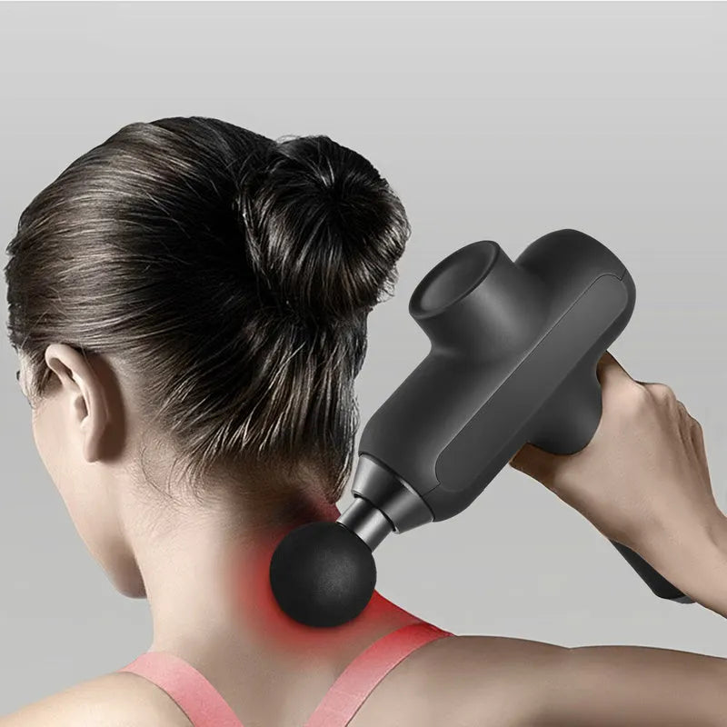 Black rechargeable muscle massager with 5 gear settings and 6 different massage head attachments.