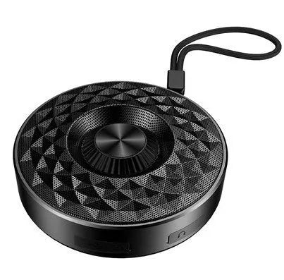 Compact black, orange, and silvery white Bluetooth wireless sound box speaker on a surface.