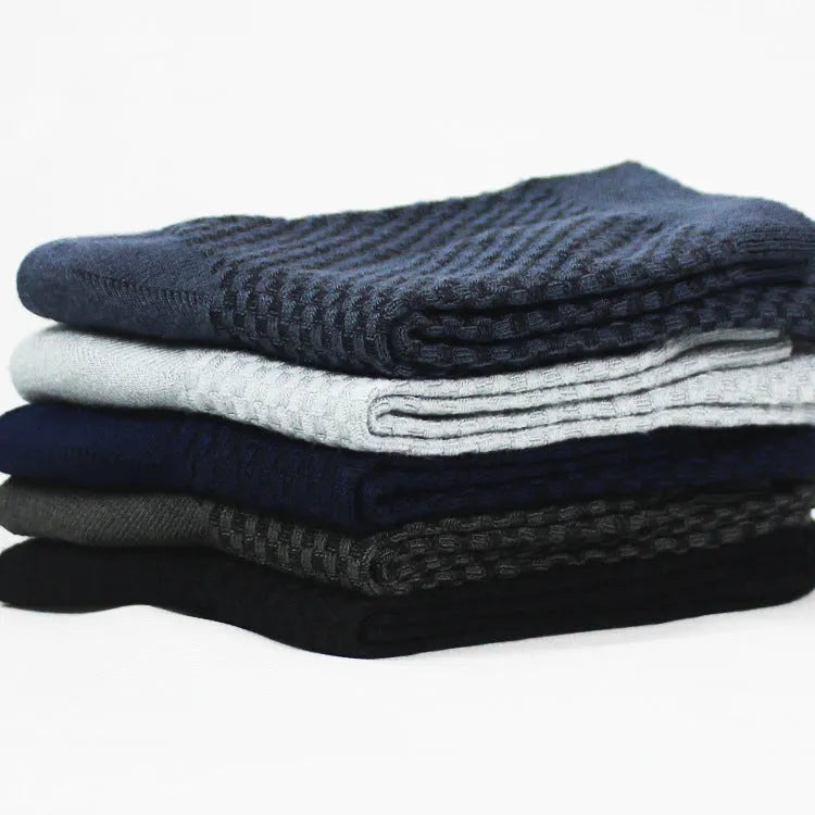 Men's bamboo fibre socks in black, navy, silver, iron grey, and grey blue with small square pattern.