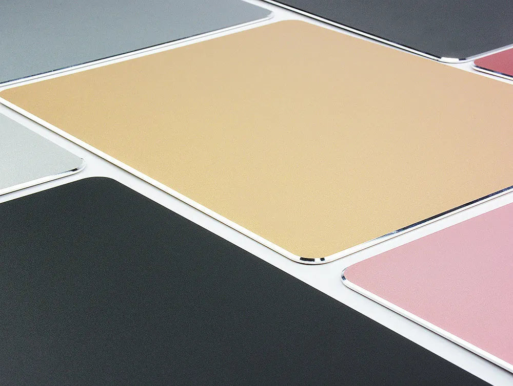 Aluminium alloy double-sided mouse pad with wrist support, USB hub, and hand warmer, in black, gold, or silver.
