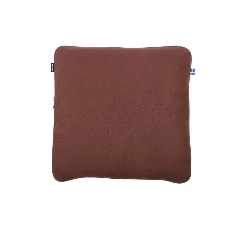 Volvo car headrest, neck pillow, and lumbar support cushion set in a minimalist design on a car seat