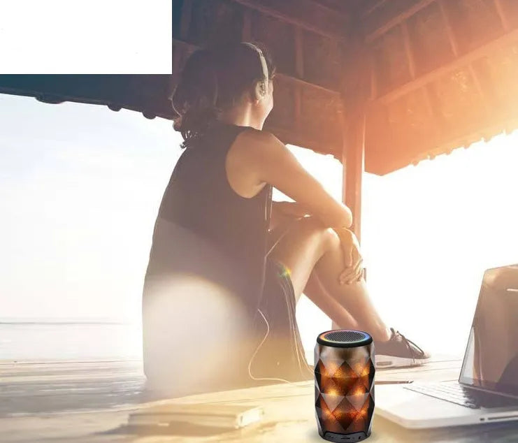 Black crystal diamond cut Coke can shaped lantern Bluetooth speaker with colourful starry sky lighting effect.