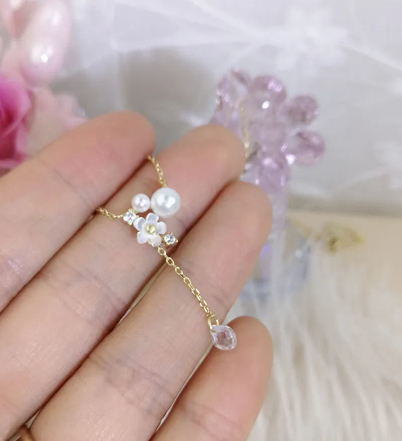 Sterling silver 925 K gold plated pendant necklace with 6mm white shell pearl, 4mm crystal, and 42+5cm clavicle chain.