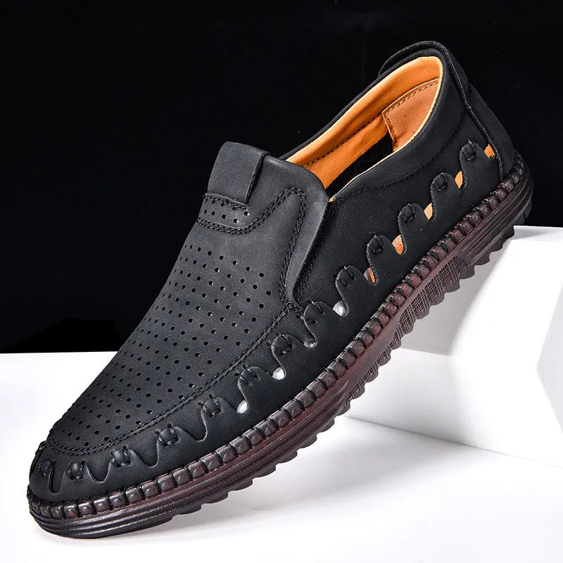 Men's brown handmade leather slip-on casual shoes with flat heel and round toe.