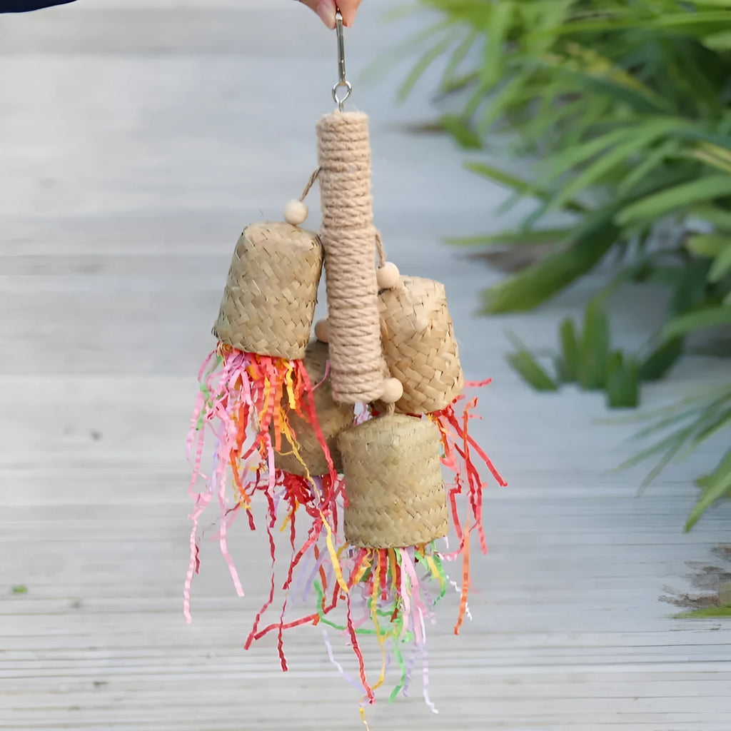 Colourful wooden shredded paper parrot chewing toy with sisal rope hanger
