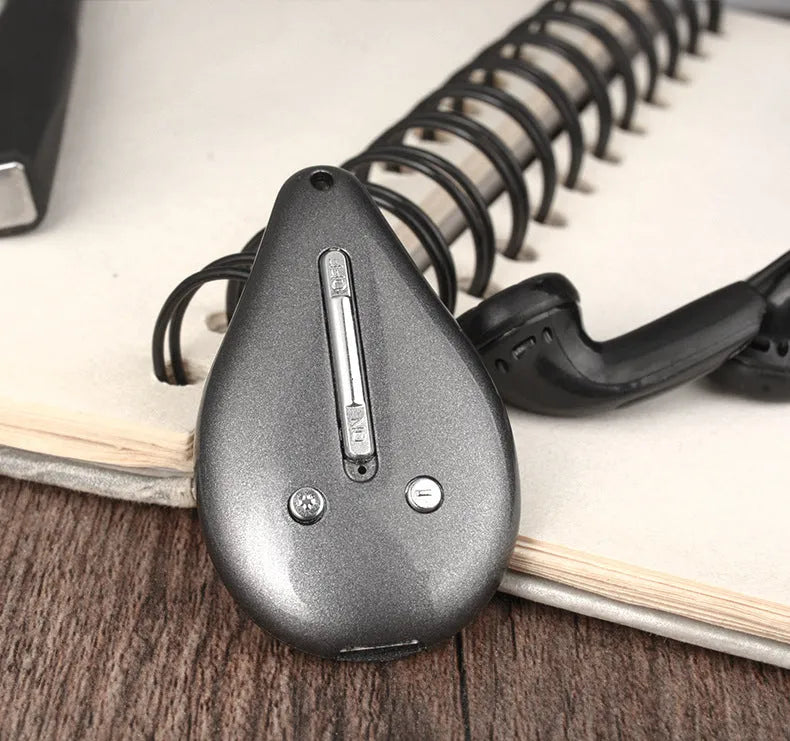 Grey mini hidden voice recorder with keychain design, 8GB memory, and USB cable