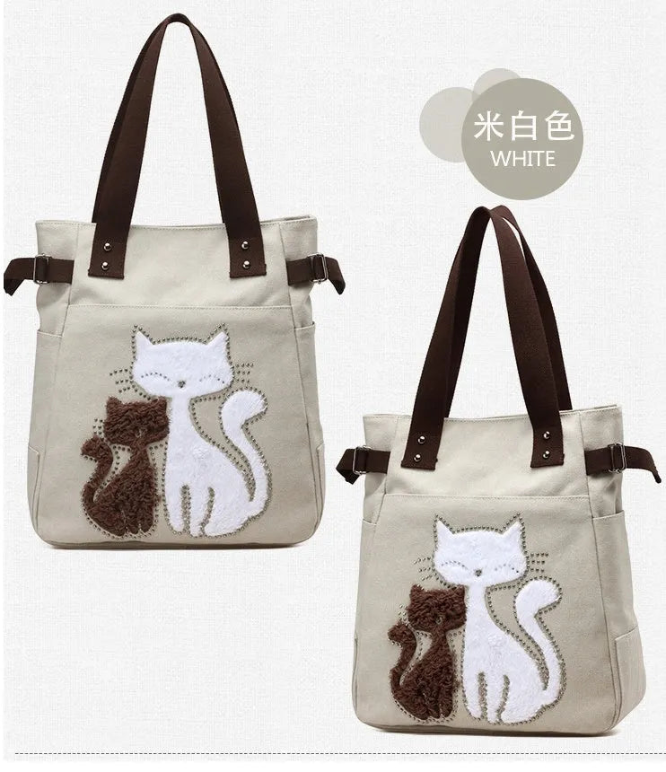 KVKY women canvas bag with plush cat applique in beige, showing shoulder strap and front pocket