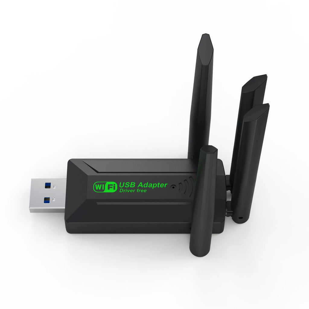 Black USB network transmitter with four external antennae for computer Wi-Fi signal boosting.