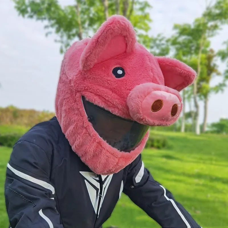 Pink pig cartoon plush protective hood cover for an average-sized motorcycle helmet.