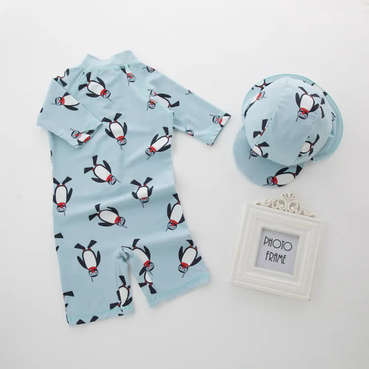 Boys' penguin print swimming costume set with long sleeves and matching swimming cap