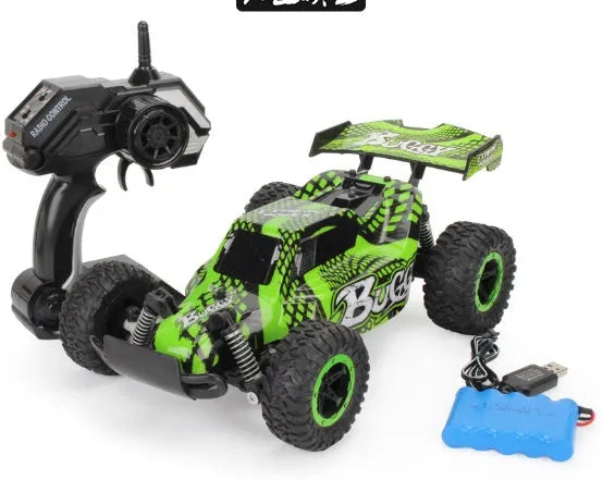Blue 1:18 scale remote control off-road drift car with 2.4GHz remote on a grey surface.