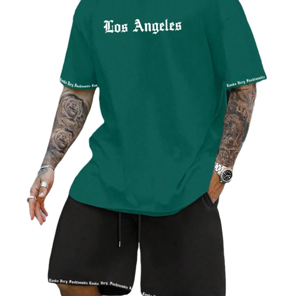 Man wearing a matching short-sleeved top and shorts from the quick-dry sports set.