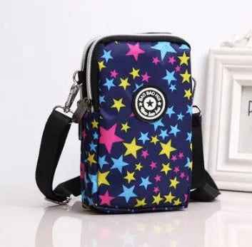 Women's vertical Oxford fabric mobile phone bag with zipper and printed design, showing internal key loop.