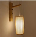 Bamboo plait wall lamp with woven construction and E27 lamp holder