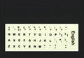 Yellow glowing PVC keyboard stickers with Arabic, Thai, Hebrew, French, Italian, and German language characters