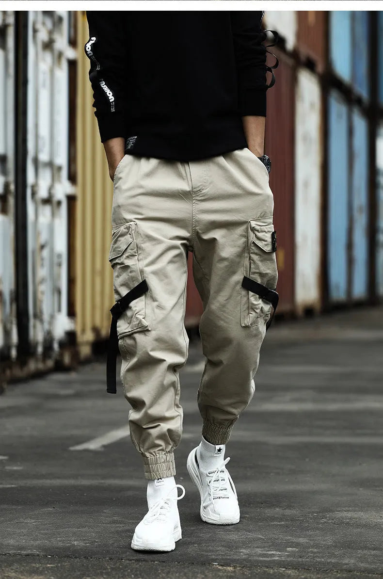 Men's cotton cargo pants in Khaki with multiple pockets, side view