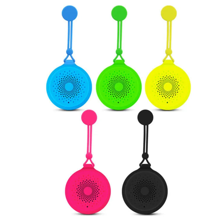Compact Bluetooth speaker with suction cup base in black, blue and pink options