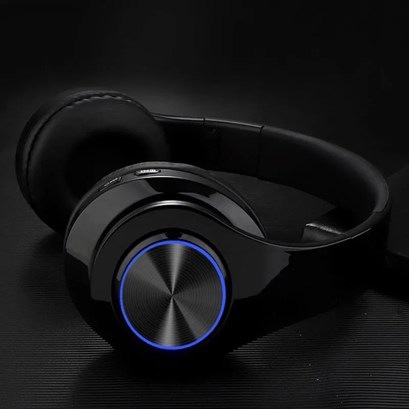 Wireless Bluetooth headset in five colour options showing head-mounted design with stereo earpieces