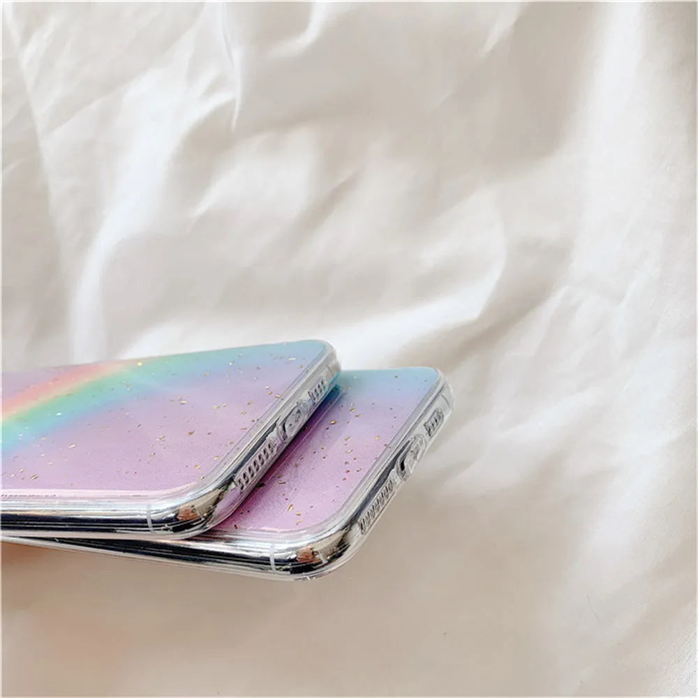 Colourful rainbow gradient striped TPU protective case for various iPhone models on a white background.
