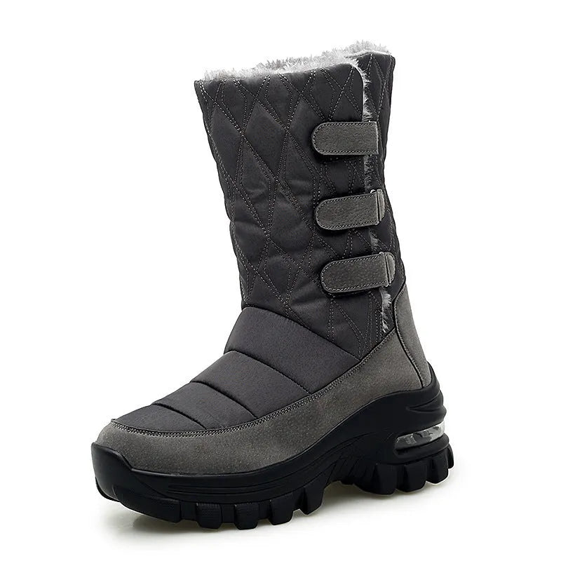 Women's high top snow boots in black with faux fur lining, 5cm heel, Velcro fastening, and PU air cushion sole.