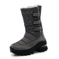 Women's high top snow boots in black with faux fur lining, 5cm heel, Velcro fastening, and PU air cushion sole.
