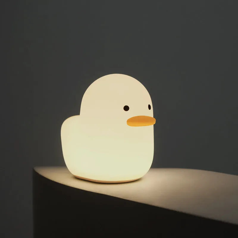 Dull duck LED night light in ABS and silica gel, 124.5mm x 76.5mm x 110mm, USB charging bedside lamp for kids' room