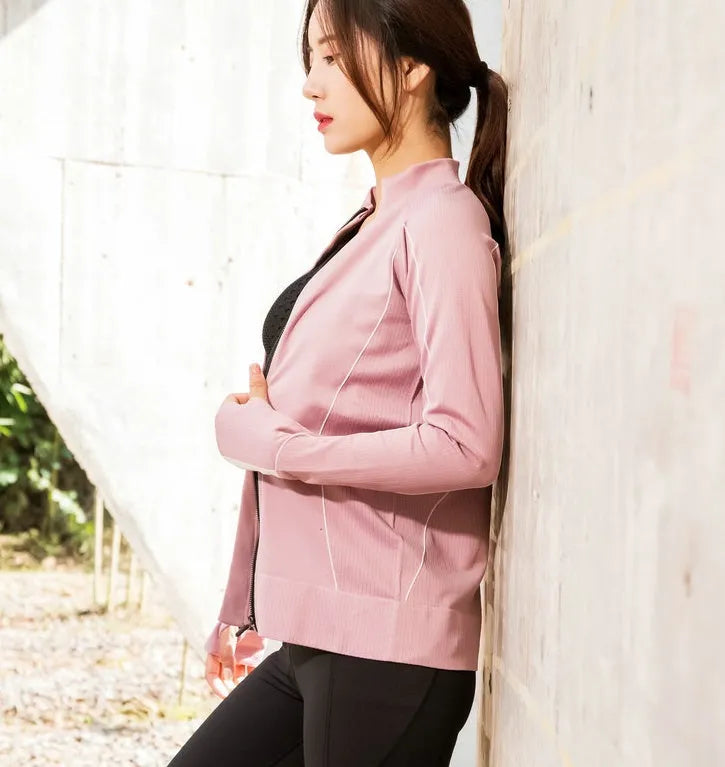 Slim fit sportswear top in grey or pink, 90% nylon and 10% spandex, sizes S M L