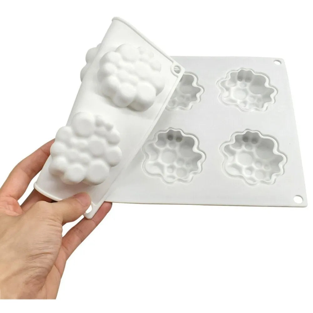 Round silicone cake mould with 8-bubble tower pattern design for baking and dessert preparation