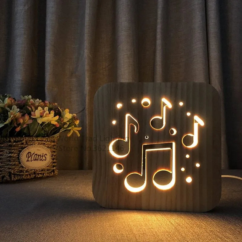 Solid pine wood cube USB atmosphere lamp glowing with warm white LED light on a wooden surface.