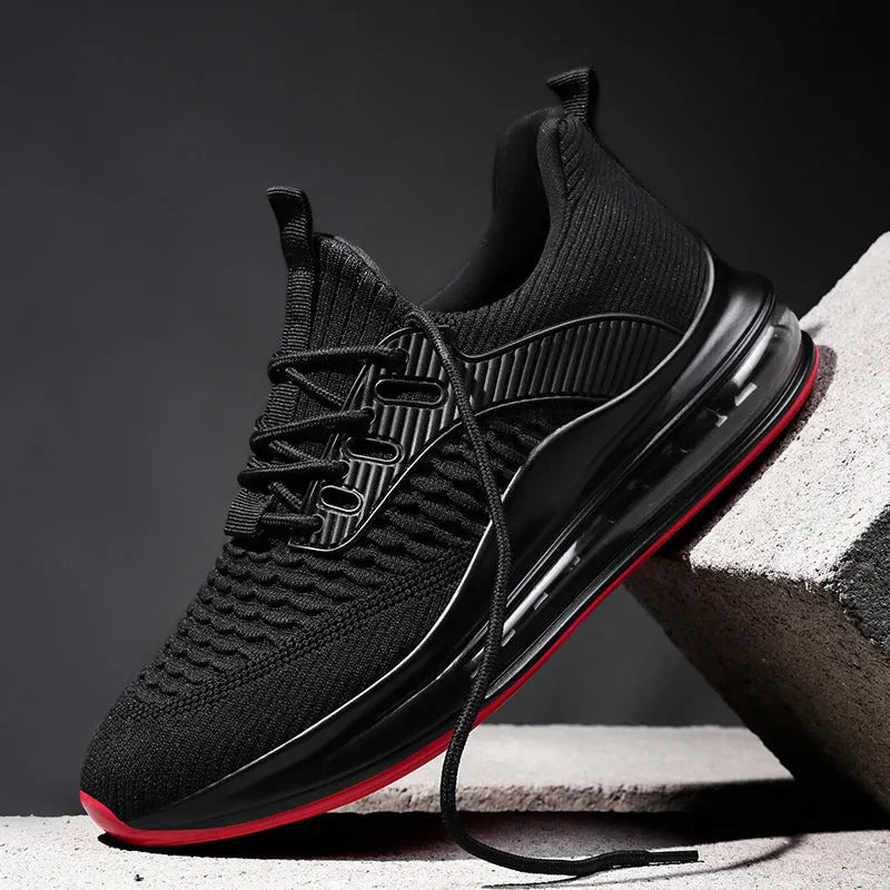 Men's low-top mesh running shoes in black with rubber sole and round toe design