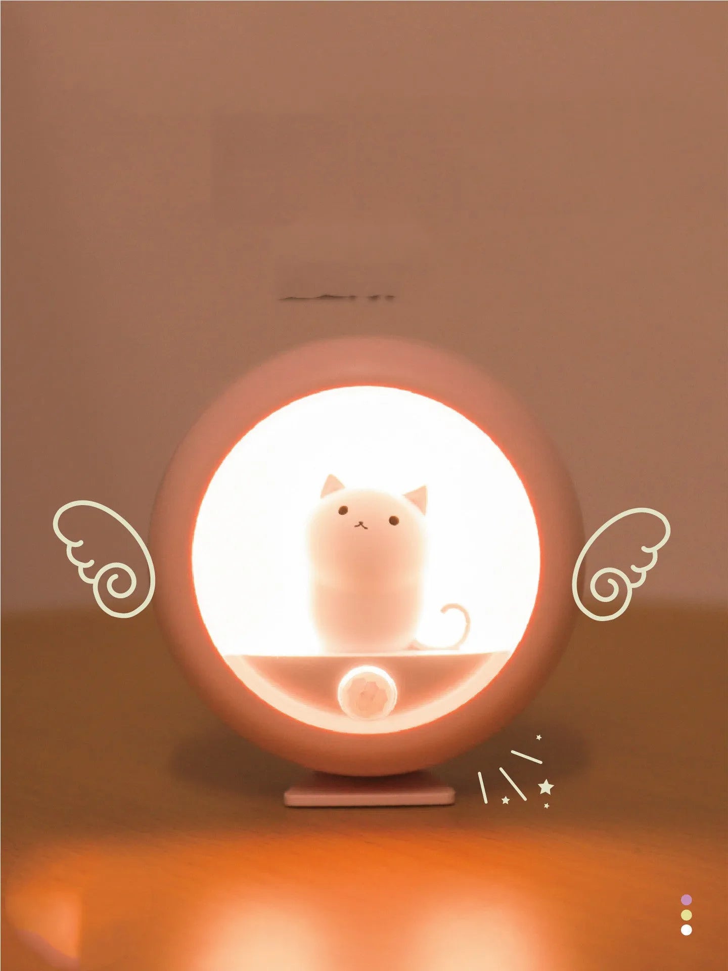Baby bedside sleep lamp showing orange, pink, and white colour options with projection light feature