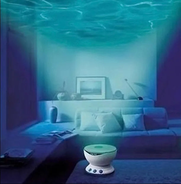 Blue ceiling-mounted ocean projection lamp showing a 2D vertical movie effect on a wall.